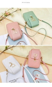 Detail of embossed V-pattern PU leather phone bags with cat ear and pearl tassel charms