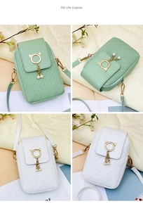 Detail of Korean crossbody bag with cat-ear metal ring and elegant pearl tassel pendant