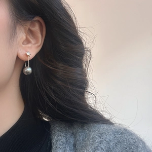 Long tassel drop earrings featuring dark grey pearls and sparkling zircon accents