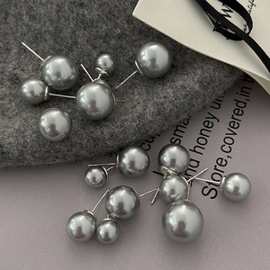 Classic grey double pearl stud earrings with matte silver finish for a minimalist look