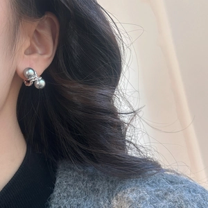Elegant twisted metal double grey pearl stud earrings with a French vintage minimalist design