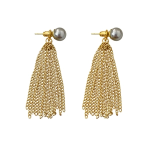 Elegant gold tassel earrings featuring round grey pearls and long hanging metal chains