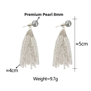 Detailed view of silver tassel earrings with 8mm grey pearls and product dimensions