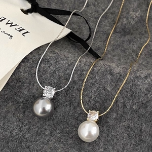 Minimalist pearl pendant necklaces with cubic zirconia in silver and gold snake chains