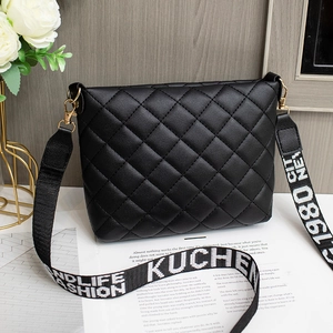 Black quilted rhombic shoulder bag with wide branded textile strap and gold metal hardware