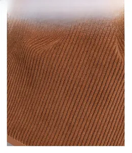 Macro detail of the premium dark brown corduroy fabric texture with vertical ridges