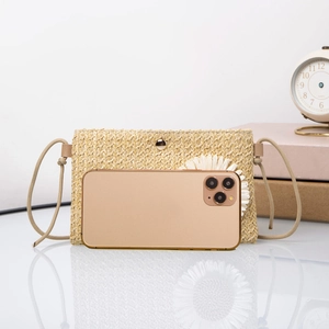 Minimalist straw woven crossbody phone bag with adjustable strap and gold metal clasp