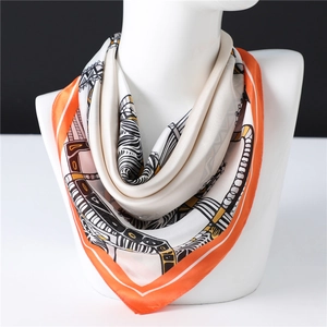70x70cm square silk scarf with orange borders and geometric patterns on a mannequin