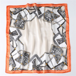 Detail of 70x70cm square silk scarf with geometric patterns and vibrant orange border