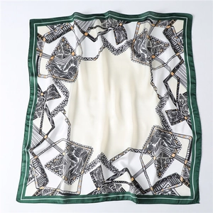 Close-up of retro geometric pattern and feather textures on high-quality silk square scarf