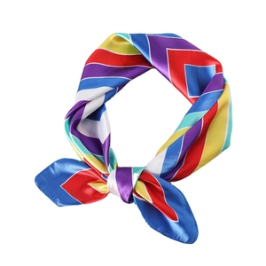 Colorful geometric striped silk scarf with elegant knotted design on white background