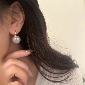French retro mermaid pearl drop earrings with iridescent luster and golden hooks