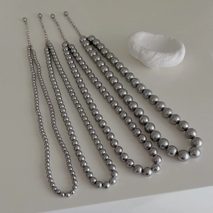 Elegant grey pearl necklace in four graduated sizes with adjustable silver clasp for women