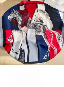 Detailed pattern of horse and floral prints on a smooth silk square scarf