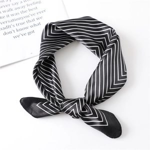 Classic black and white striped satin square scarf styled in a professional neck tie knot