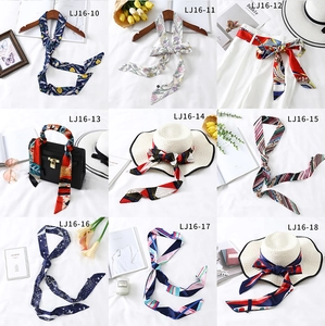 Detailed grid of nine diverse printed twilly silk scarves for versatile styling options