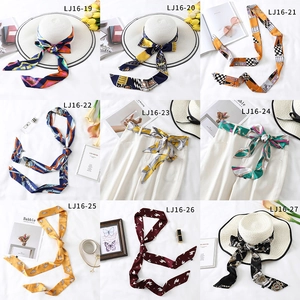 Collection of skinny silk scarves in nine patterns for neckties, belts or hat decor