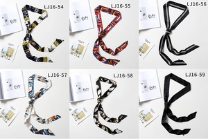 Collection of six elegant skinny scarves with various vintage patterns and silk texture