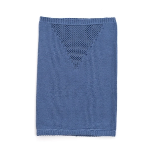 Close-up of blue knitted neck warmer featuring rib-knit texture and breathable vent holes