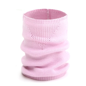 Close-up of pink knitted neck gaiter showing breathable mesh texture and fine yarn details
