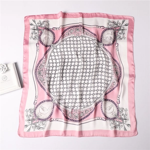 Pink and white square silk scarf with vintage chain, belt, and swan patterns on it