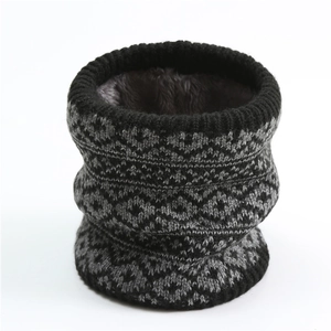 Detail of winter neck warmer with knit diamond pattern and soft gray fleece lining