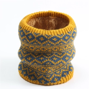 Detailed view of yellow and blue knitted neck warmer with thick faux fur fleece lining