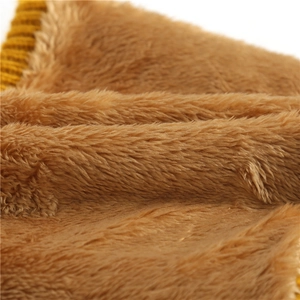 Close-up of soft brown plush lining and yellow knit edge of the winter neck warmer