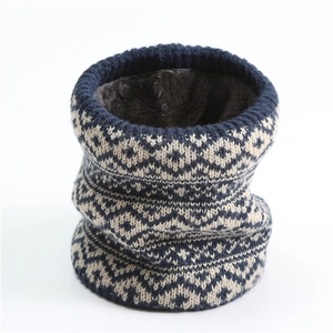 Detailed view of the diamond pattern knit fabric with thick faux fur lining for warmth