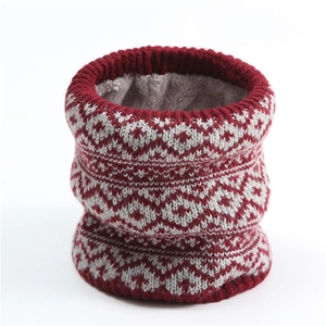 Close-up of winter knit neck warmer featuring red geometric pattern and thick fleece lining