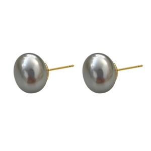 French vintage grey pearl stud earrings with metallic gold posts on white background