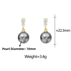 Detail of dark grey 10mm pearl earrings with gold metal and rectangular zircon studs