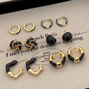 French vintage gold and black oil drip earring set with six pairs of stylish hoops and studs