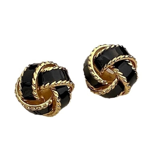 French vintage black and gold enamel twist earrings with minimalist knot design