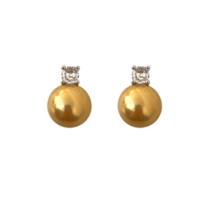 Elegant gold pearl earrings featuring sparkling zircon stones with a four-prong setting