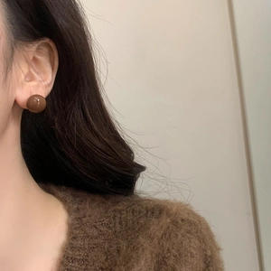 French vintage style round brown resin stud earrings for women with a glossy finish