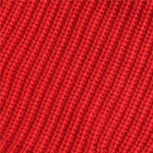 Close-up of bright red chunky knit scarf showing warm ribbed texture and thick material