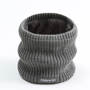 Detail of grey knitted winter snood with warm fleece lining and Halowint embroidery