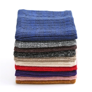 Detailed texture of thick knit infinity scarves available in multiple vibrant colors