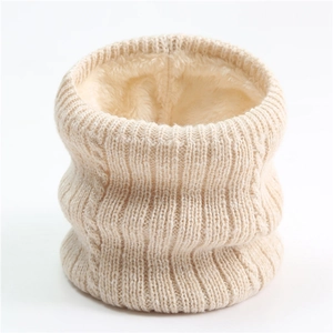 Detail of cream cable knit texture and soft plush fleece lining on thermal winter neck warmer