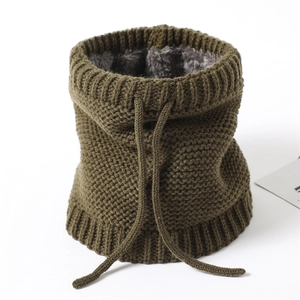 Detailed close-up of dark green knitted neck warmer with plush gray fleece lining and drawstring