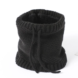 Detailed close-up of black knitted neck warmer with thick fleece lining and adjustable drawstring