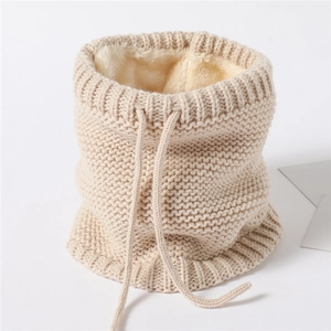 Detail of knitted beige neck warmer with thick fleece lining and adjustable drawstring