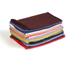 Detailed view of knitted neck warmer in twelve vibrant colors with soft ribbed texture