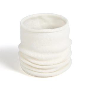 Detailed view of white knitted neck gaiter featuring fine stitch texture and rolled edges