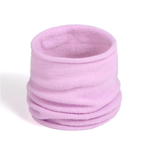 Close-up of the soft pink knit texture and fine ribbed details on the neck warmer