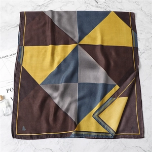 Minimalist geometric striped scarf with yellow and brown color-blocking design