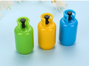 Detail of gas tank shaped retractable pens in green, yellow, and blue colors