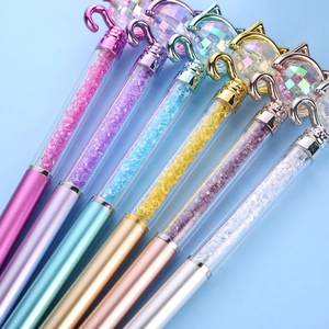 Creative crystal ballpoint pens with cat ear accents and glittering diamond filling