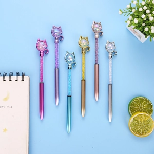 Detailed view of six creative cat-shaped crystal ballpoint pens in vibrant metallic colors